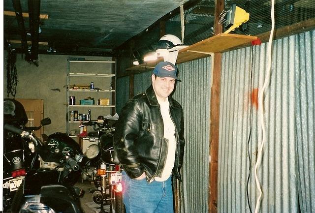 The Sedgwick garage, where much could be accomplished with an R65 tool kit, a hammer and liquid wrench.  Horsehide NYC police jacket considered quality riding gear.