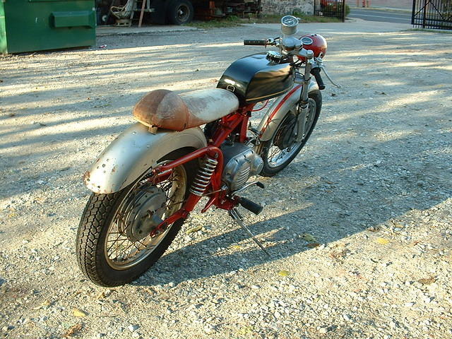 Aermacchi with disassembled top-end and Negrini tank.