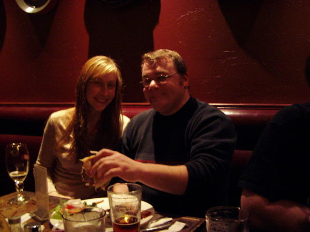 Leah and Andy breaking bread.