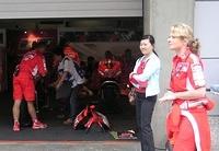 Ducati Marlboro pit. Maximize the photo, then squint real hard, and you'll see a blurry Casey Stoner.